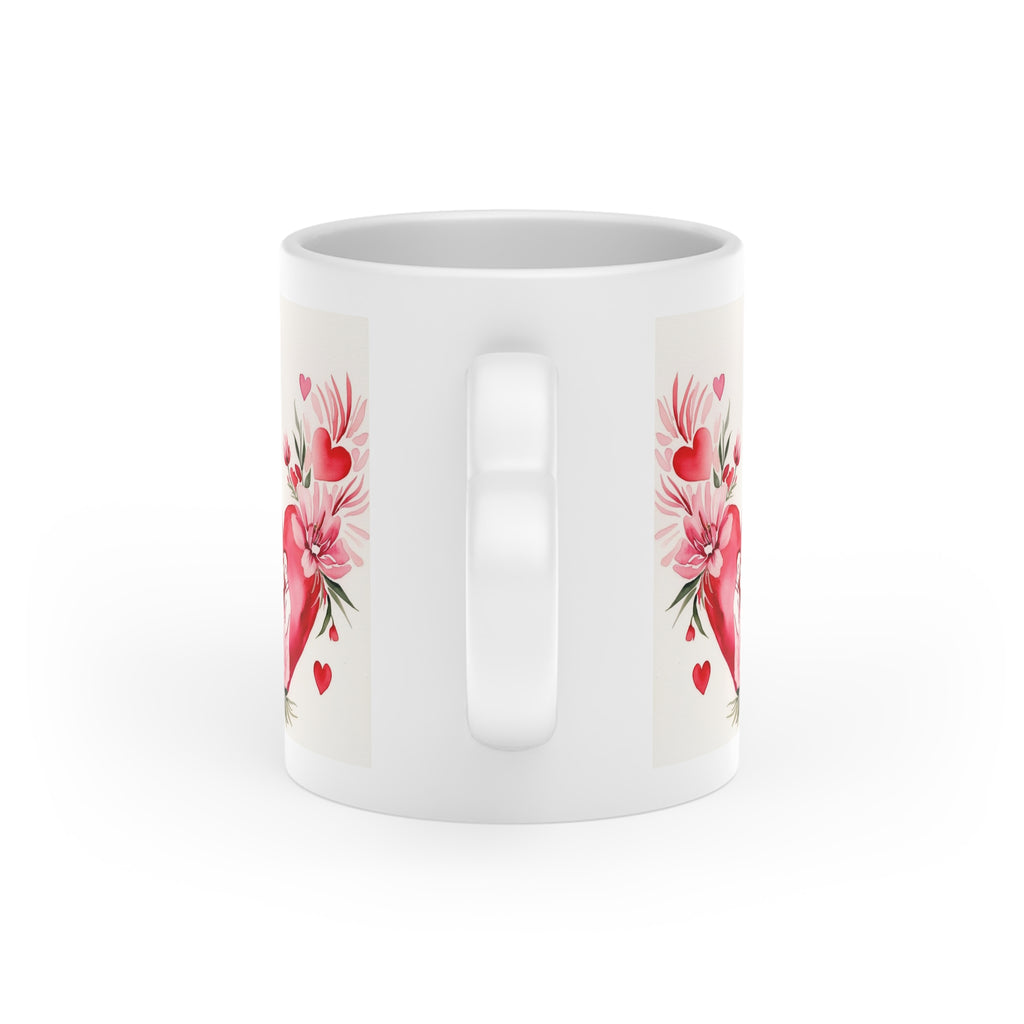 Heart-shaped ceramic mug with elegant floral design. Ideal Valentine's Day or romantic gift. Premium quality, beautiful presentation. Order today!